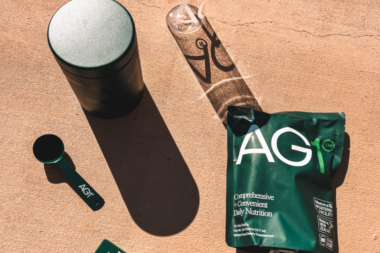 AG1 Athletic Greens box subscription with AG1 Canister, AG1 Scoop, AG1 30-day pouch, AG1 Water Bottle and AG1 Vitamin D drops
