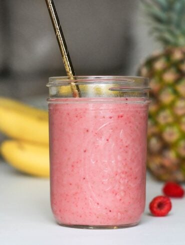 pink fruit shake in jar